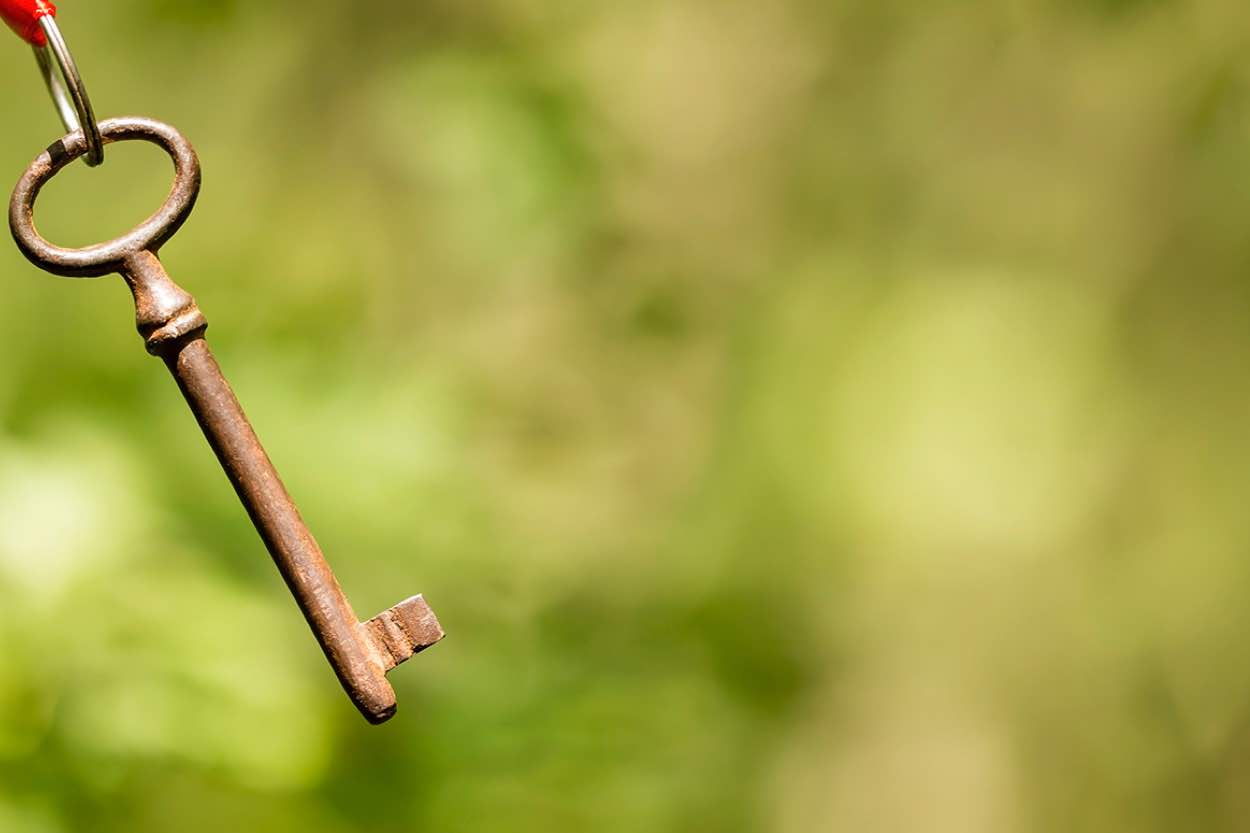 An old rusty key on a keyring